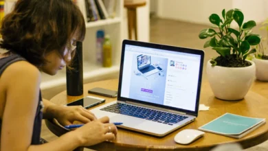 woman browsing on her laptop scaled 1