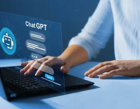 Business owner using ChatGPT on a laptop to manage tasks and boost productivity