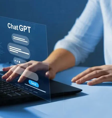 Business owner using ChatGPT on a laptop to manage tasks and boost productivity