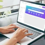 Laptop screen showing Canva dashboard with a person creating a digital product for sale