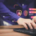 Man Typing passwords, implementing Two-Factor Authentication