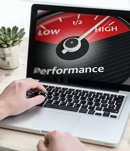 Speedometer gauge with glowing dial symbolizing improved WordPress site speed and performance.