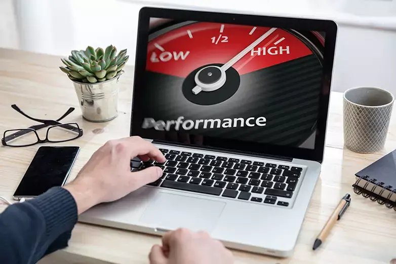 Speedometer gauge with glowing dial symbolizing improved WordPress site speed and performance.